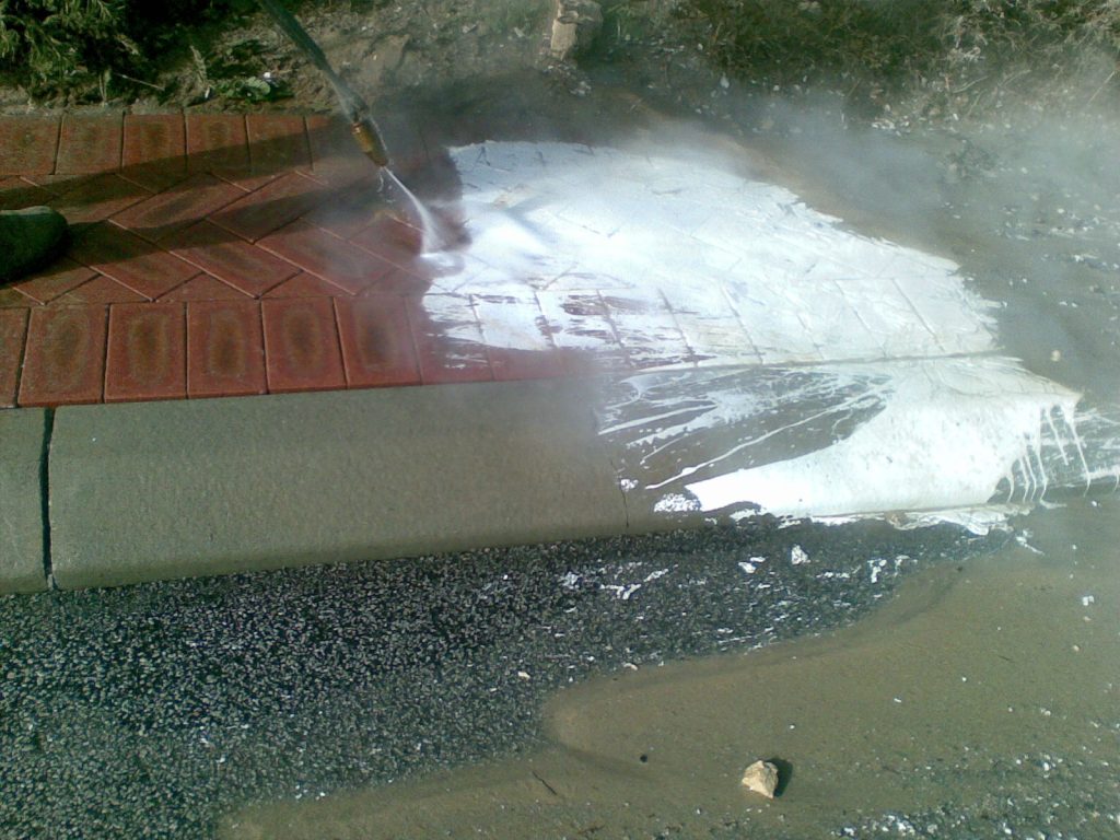 Paint on road - Showing Cleaning Process